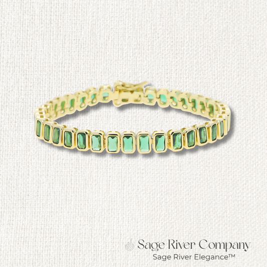 Gold tennis bracelet with emerald-cut green CZ stones and secure box clasp – Sage River Company